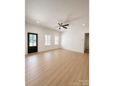 Escape to the lake in this stunning, newly constructed 3-bedroom - photo 3