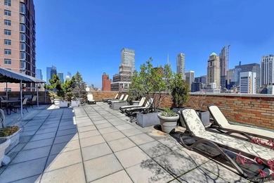 This tastefully renovated studio sits high on the 17th floor of - photo 12