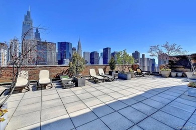 This tastefully renovated studio sits high on the 17th floor of - photo 13