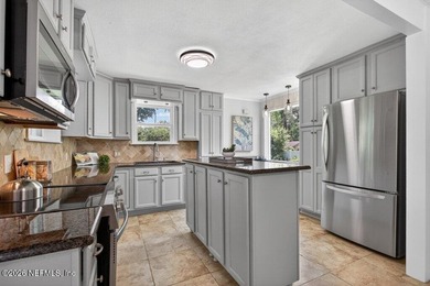 Timeless charm meets modern living in this beautifully updated - photo 21