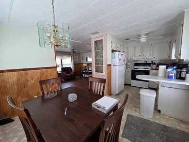 This 2 bed 1.5 bath home is located in Teakwood Village a 55+ - photo 3