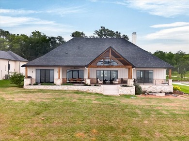 Experience refined lake living in this exceptional - photo 26