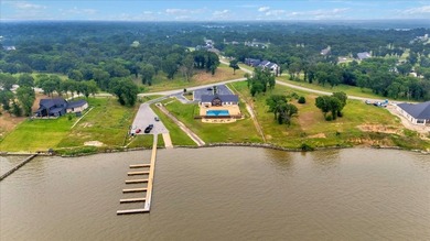 Experience refined lake living in this exceptional - photo 30