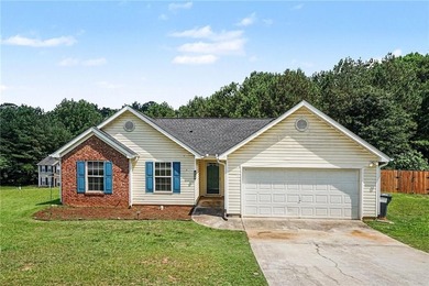 Welcome home to this inviting 3-bedroom, 2-bath ranch nestled in - photo 1