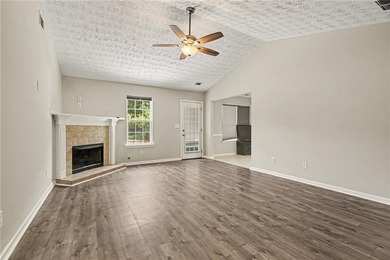 Welcome home to this inviting 3-bedroom, 2-bath ranch nestled in - photo 3