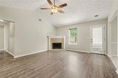 Welcome home to this inviting 3-bedroom, 2-bath ranch nestled in - photo 4