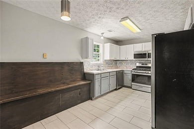 Welcome home to this inviting 3-bedroom, 2-bath ranch nestled in - photo 8