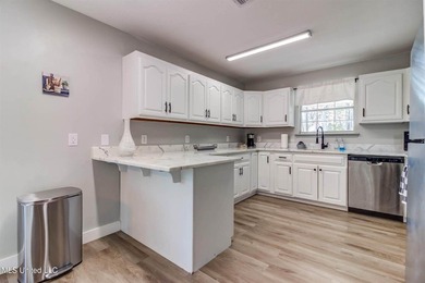 Situated on 1.5 acres in the peaceful Gulfport countryside, this - photo 13