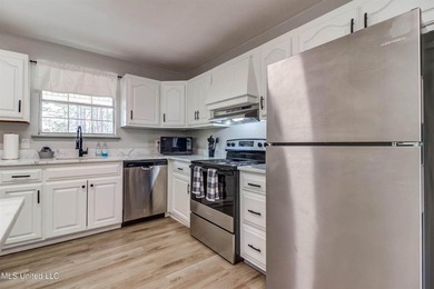 Situated on 1.5 acres in the peaceful Gulfport countryside, this - photo 14