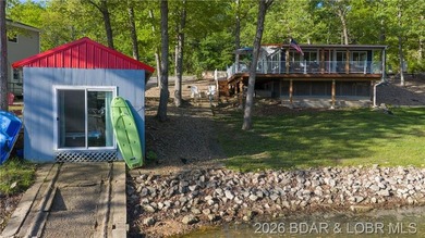 This Cape Cod cottage offers the quintessential lake escape - photo 2