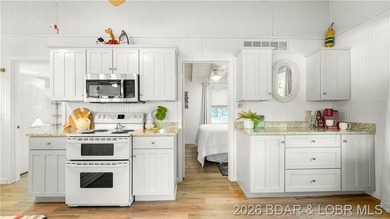This Cape Cod cottage offers the quintessential lake escape - photo 3