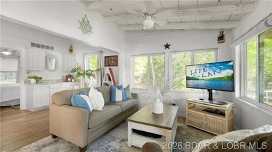 This Cape Cod cottage offers the quintessential lake escape - photo 7