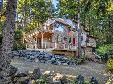 Escape to this treehouse-like retreat tucked safely high on a - photo 1