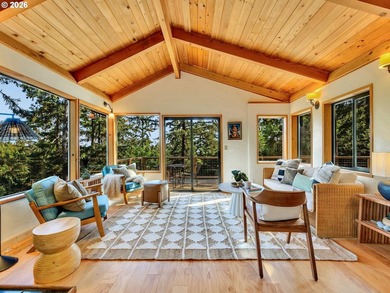 Escape to this treehouse-like retreat tucked safely high on a - photo 3