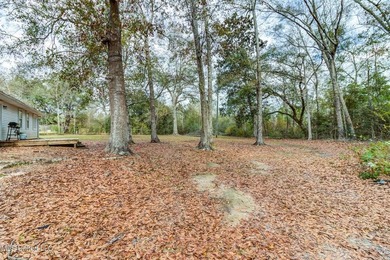 Situated on 1.5 acres in the peaceful Gulfport countryside, this - photo 42