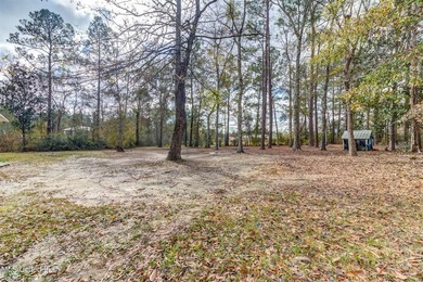 Situated on 1.5 acres in the peaceful Gulfport countryside, this - photo 47