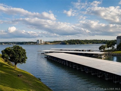 Enjoy lake life at its best in this beautifully updated - photo 1
