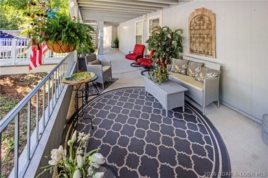 Enjoy lake life at its best in this beautifully updated - photo 4
