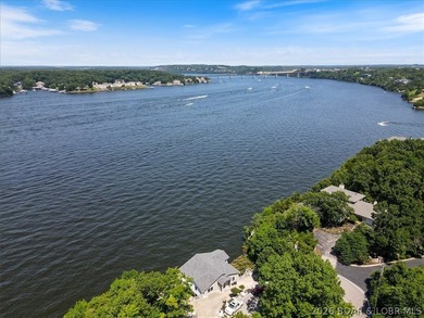 Perched above the shimmering waters of the Lake of the Ozarks - photo 7