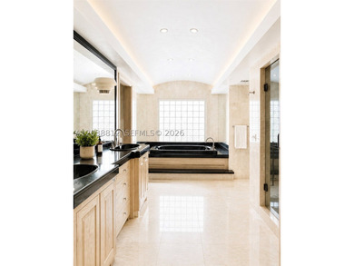 Nestled on a spectacular 1.51-acre estate lot in the heart of - photo 11