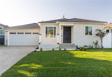 Welcome to this beautifully refreshed home located in the - photo 1