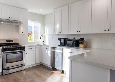 Welcome to this beautifully refreshed home located in the - photo 4