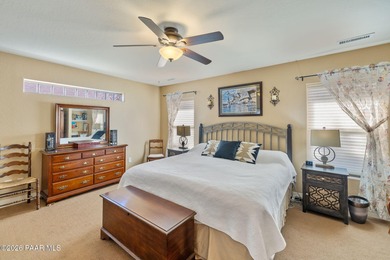 Situated in the highly sought-after Prescott Lakes community