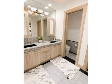 Nestled on a spectacular 1.51-acre estate lot in the heart of - photo 23