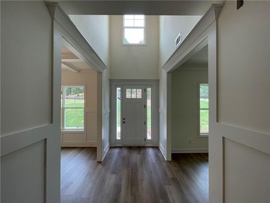 Stunning 2-story home with a 3rd car garage in a coveted