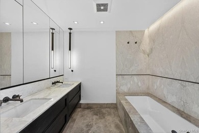 A full-floor residence at 175 West 10th Street, this 3-bedroom - photo 7