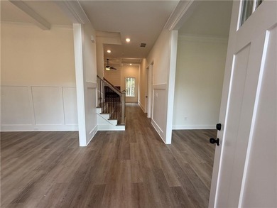 Stunning 2-story home with a 3rd car garage in a coveted