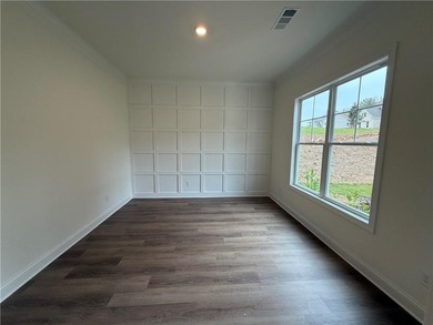 Stunning 2-story home with a 3rd car garage in a coveted