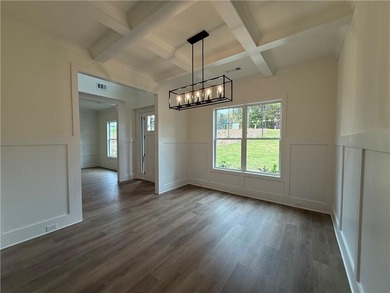 Stunning 2-story home with a 3rd car garage in a coveted