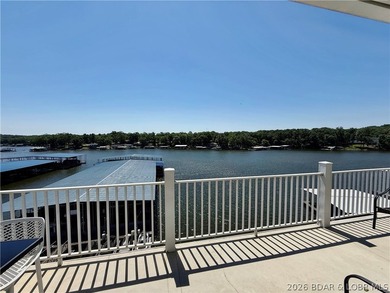 Lake life just got a serious glow-up! This beautifully remodeled - photo 1