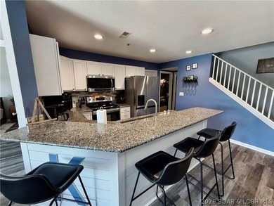 Lake life just got a serious glow-up! This beautifully remodeled - photo 8
