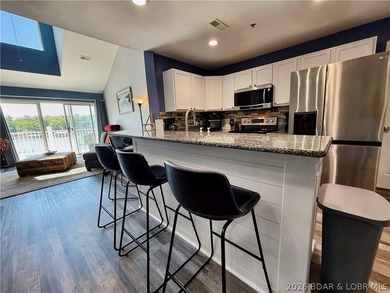 Lake life just got a serious glow-up! This beautifully remodeled - photo 10