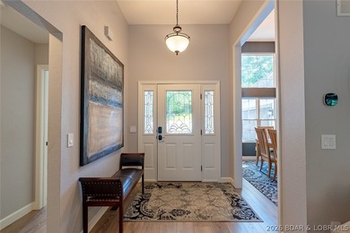Located on a quiet cul-de-sac w/seasonal lake view in the highly - photo 3