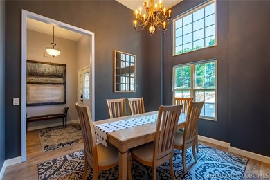 Located on a quiet cul-de-sac w/seasonal lake view in the highly - photo 9