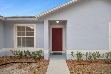 Welcome home to this exquisite three-bedroom, two-bathroom gem - photo 3