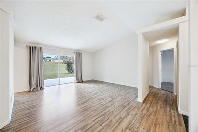 Welcome home to this exquisite three-bedroom, two-bathroom gem - photo 10