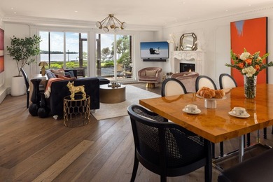 This open-concept living and dining space is designed for - photo 1