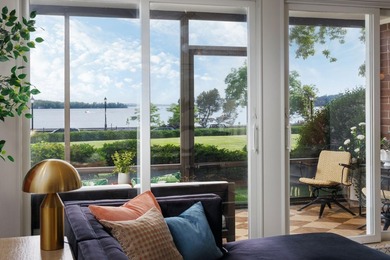 This open-concept living and dining space is designed for - photo 2