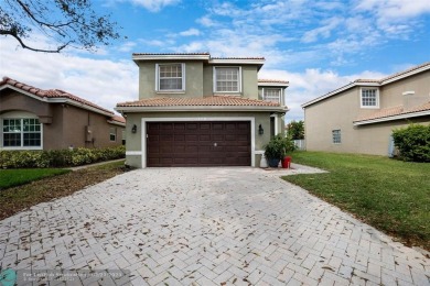 Lake Home For Sale in Coconut Creek, Florida