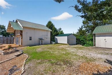 Lake of the Ozarks home with waterfront lot and 4 additional - photo 5