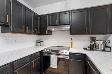 Welcome to your updated riverfront condo just steps to Mill - photo 2
