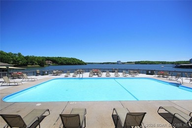 Enjoy lake living at its finest in this beautifully updated - photo 1