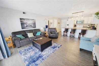 Enjoy lake living at its finest in this beautifully updated - photo 7