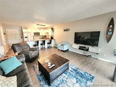 Enjoy lake living at its finest in this beautifully updated - photo 8