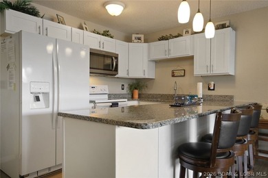 Enjoy lake living at its finest in this beautifully updated - photo 10
