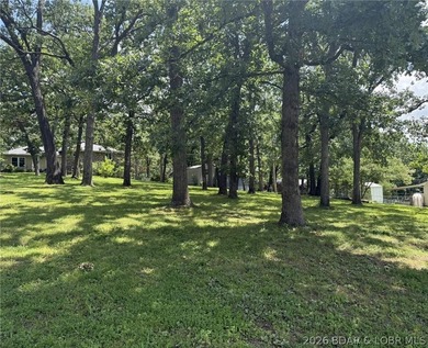 Great building lot in Warsaw! Nice big, shaded corner lot, just - photo 5